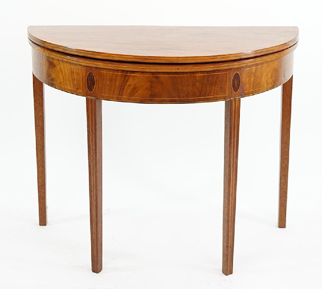 A Flip Top Demilune Table. (1 of 2)