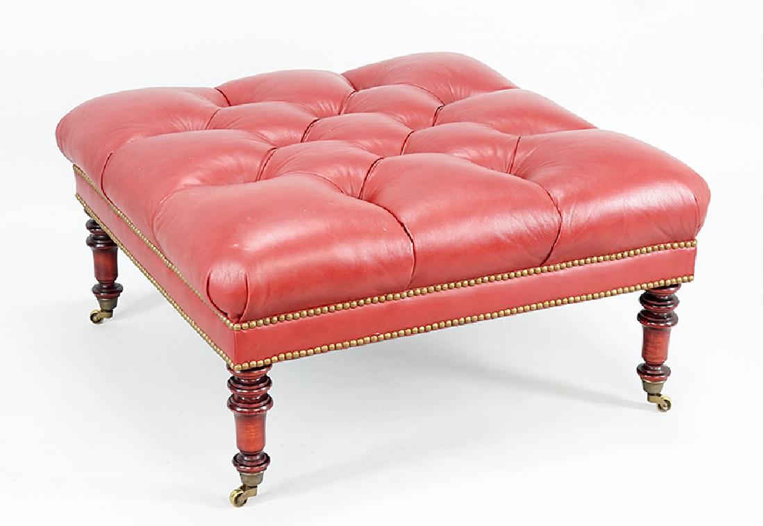 A Red Leather Ottoman. (1 of 1)