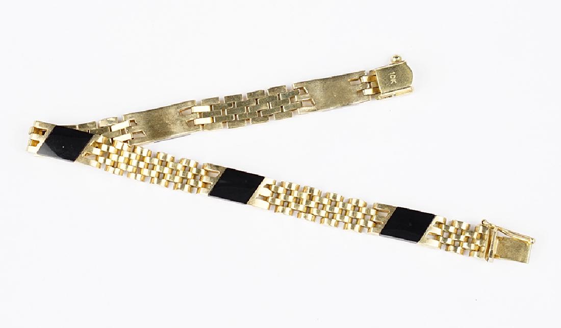 An Onyx and 10 Karat Yellow Gold Bracelet. (1 of 1)
