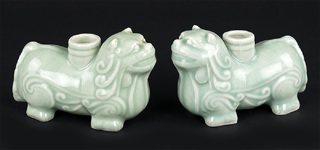 A Pair of Celadon Glazed Foo Lion Form Candle Holders. (1 of 1)