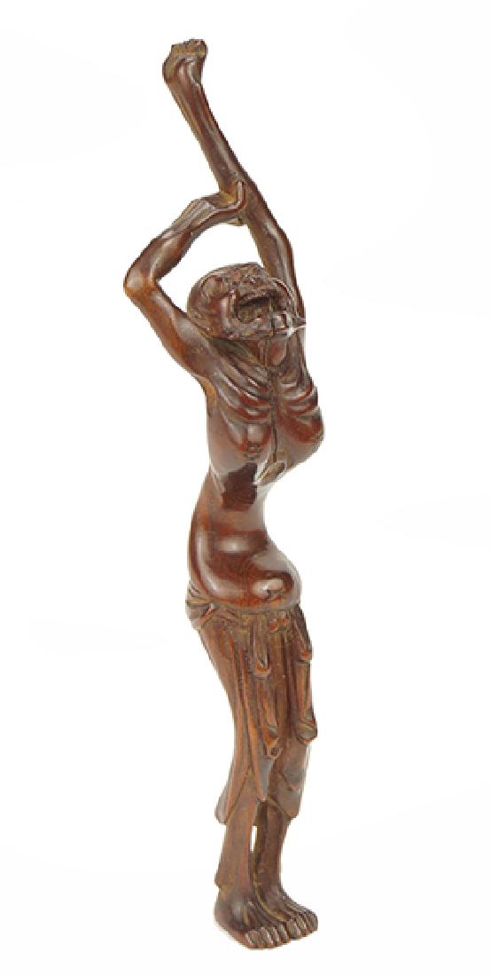 A Carved Wood Netsuke by Naomitsu. (1 of 10)