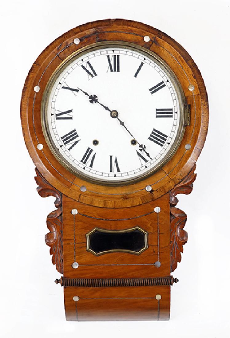 A Carved Walnut Wall Clock. (1 of 1)