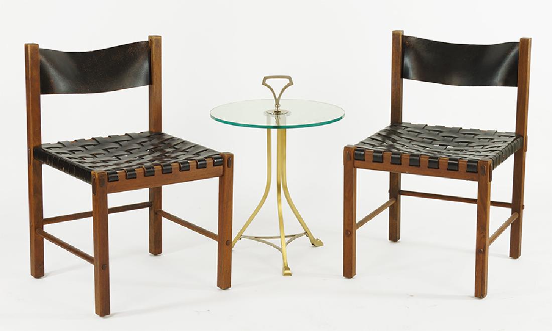 A Pair Of Teak And Leather Side Chairs. (1 of 1)