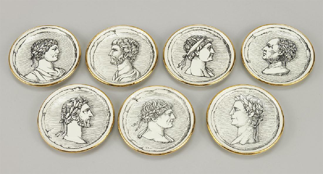 A Set of Seven Galbiati Gilt Porcelain Coasters.: A Set of Seven Galbiati Gilt Porcelain Coasters. With original box, each with depicting Greco-Roman bust Diameter: 4"