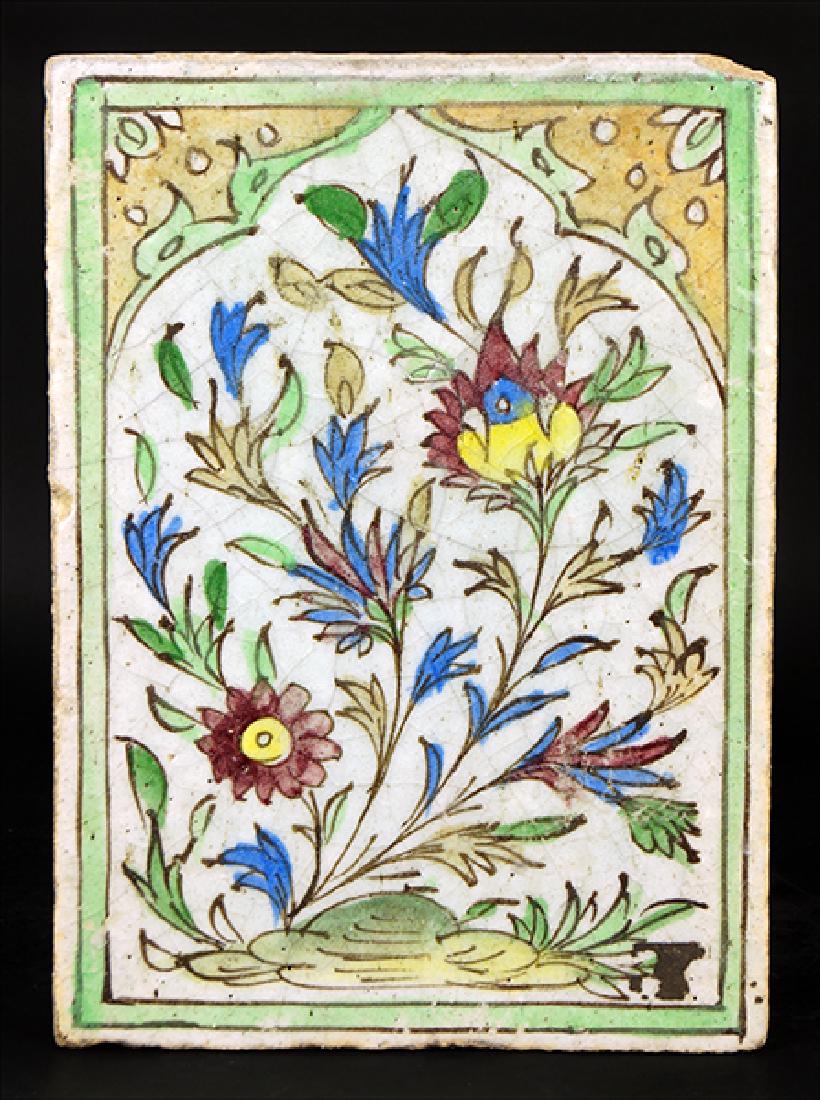 A Persian Glazed Ceramic Tile. (1 of 1)