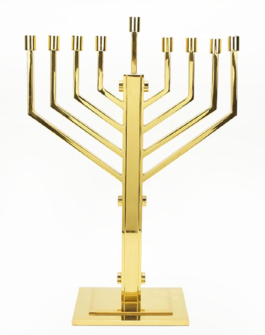 A Gold Tone Menorah.: A Gold Tone Menorah. With removable candle cups 25.75" x 18" x 8"