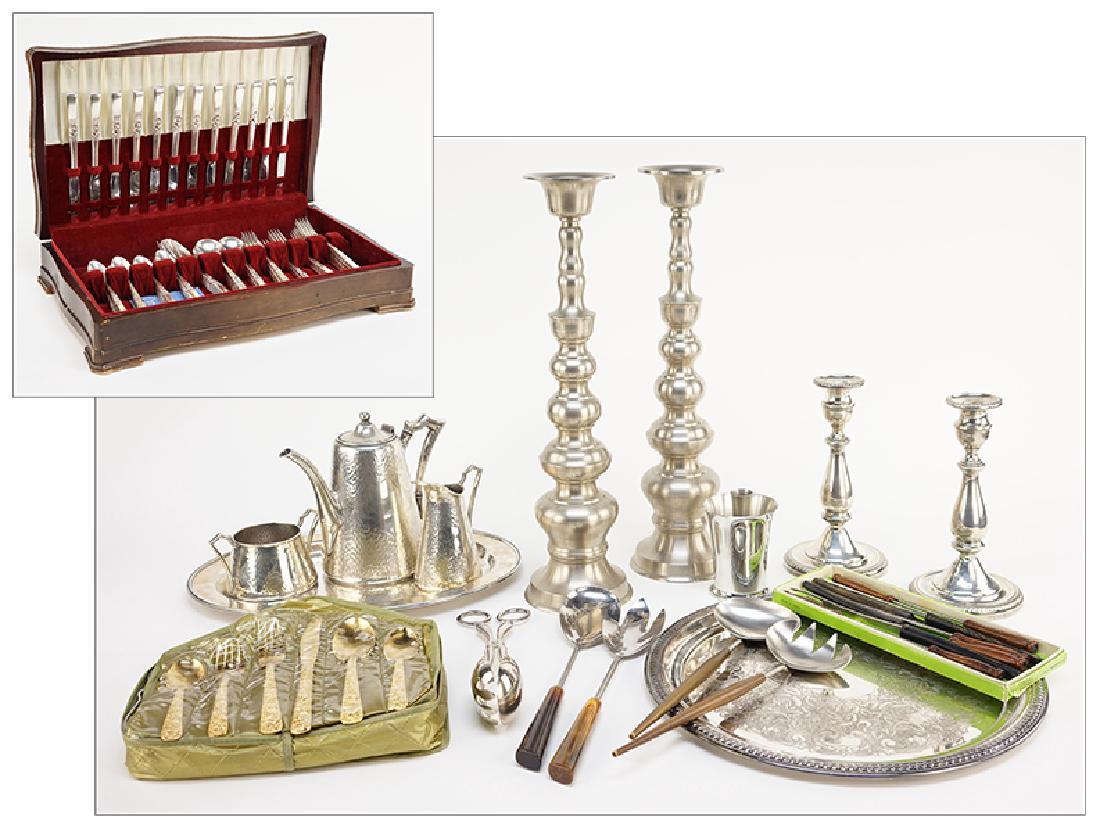 A Pair Of Weighted Sterling Silver Candlesticks. (1 of 1)