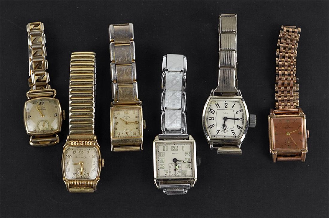 A Collection of Watches.: A Collection of Watches. Comprising four Elgin, one Helbros, and one Bulova. Susanin's will not comment on the working condition of any watch or clock movement