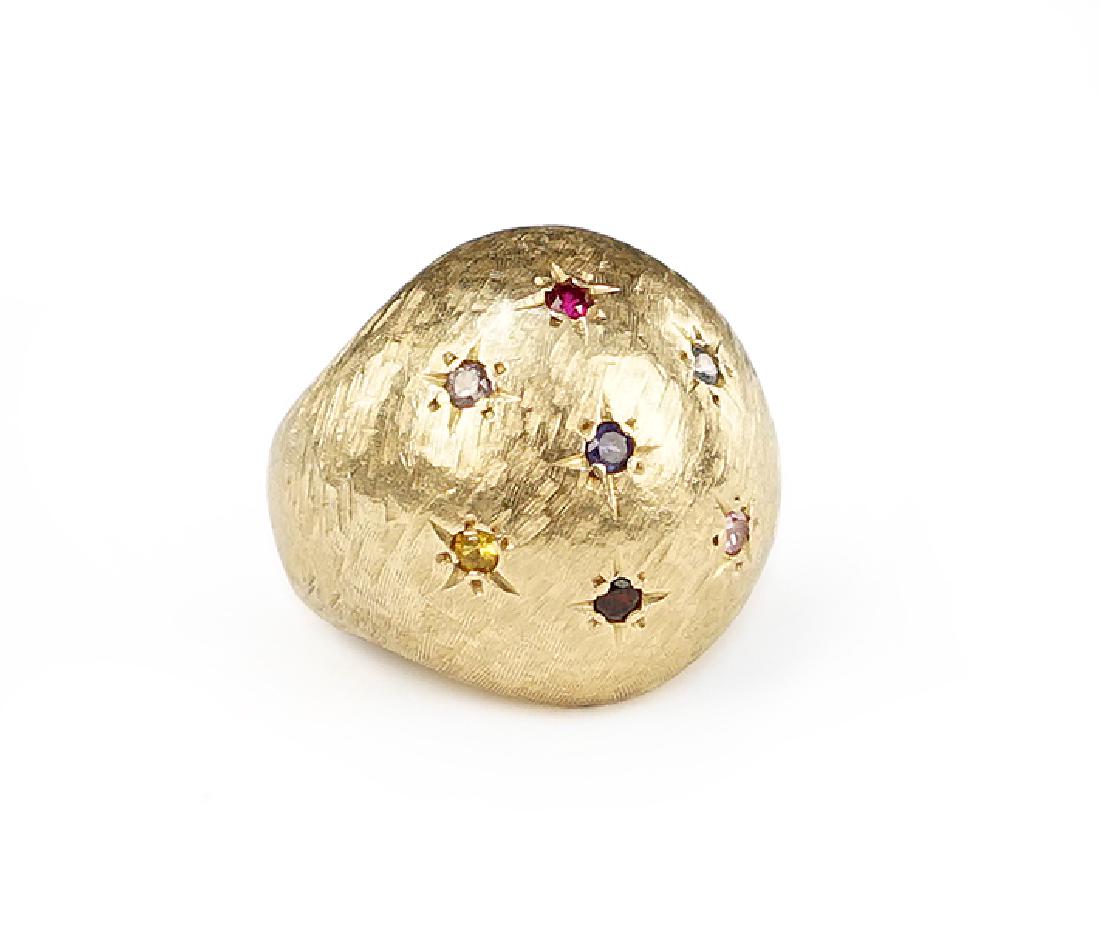 A Gem Set Dome Ring. (1 of 2)