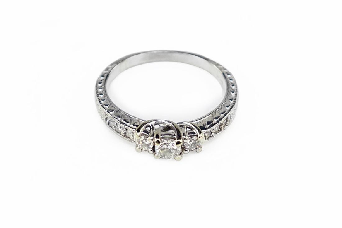 A Diamond and 14 Karat White Gold Ring. (1 of 1)