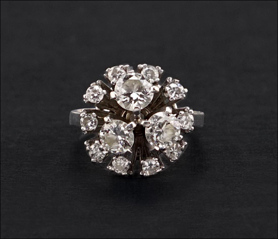A Diamond and 14 Karat White Gold Ring. (1 of 2)