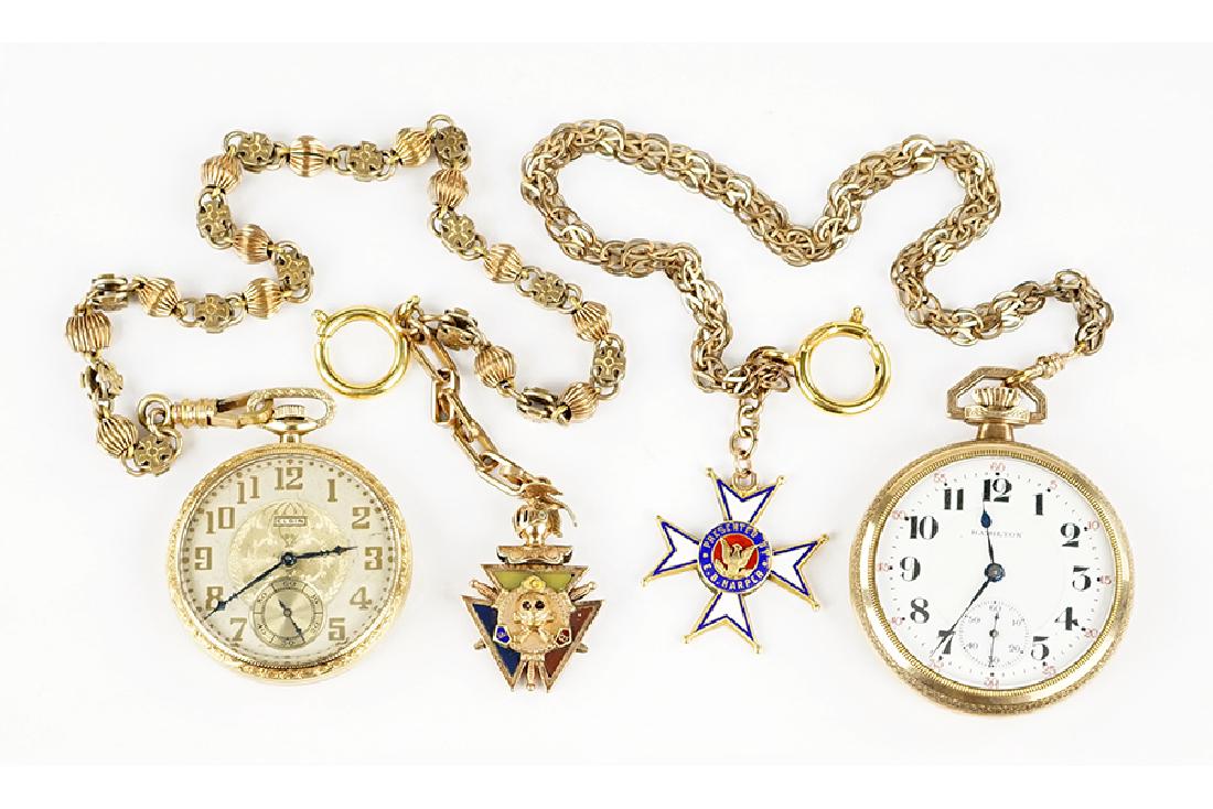 Two Goldfilled Masonic Watch Fobs.: Two Goldfilled Masonic Watch Fobs. Together with a Hamilton goldfilled pocket watch, an Elgin goldfilled pocket watch, and two goldfilled watch chains
