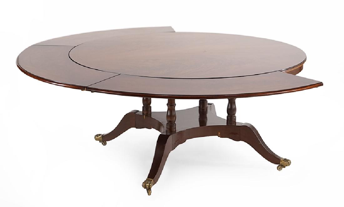 A Round Mahogany Dining Table. (1 of 1)