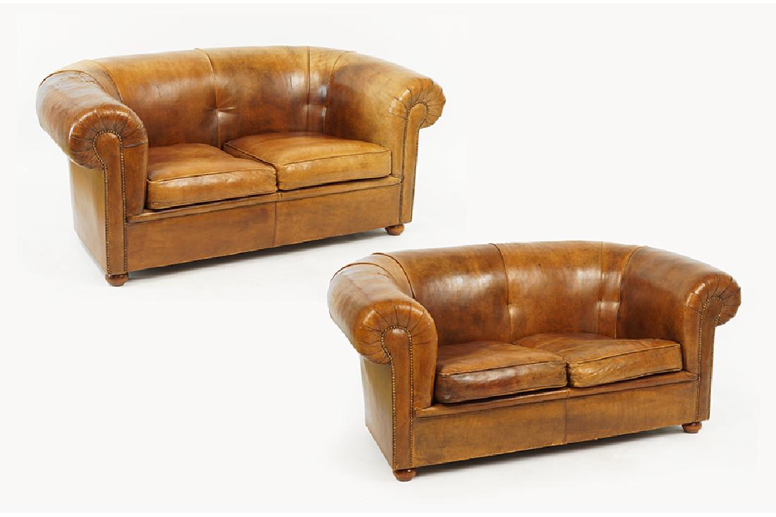 A Pair Of Leather Upholstered Settees. (1 of 10)