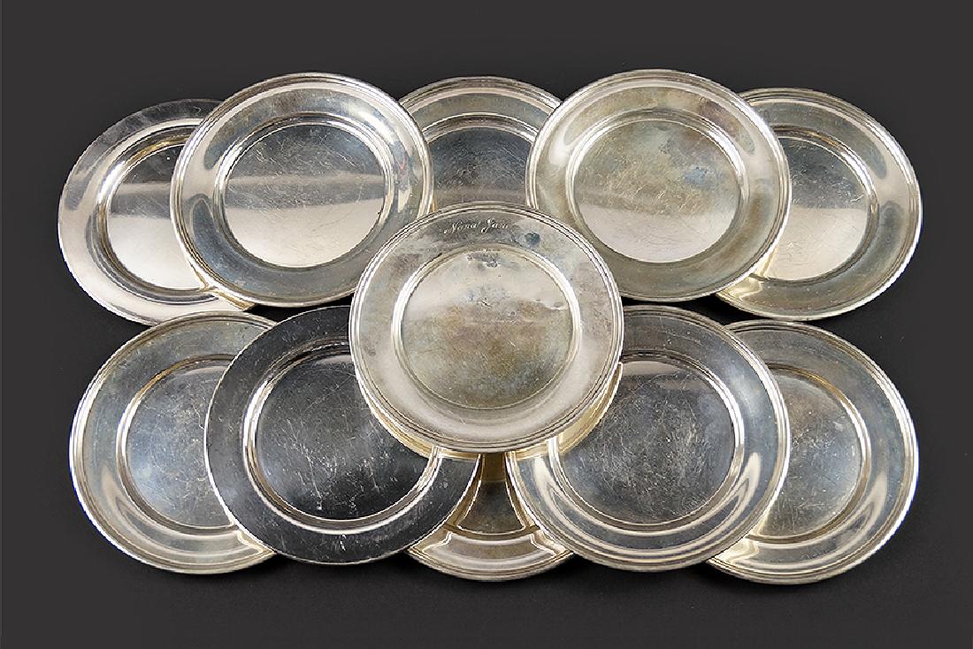 A Set of Eight Randahl Sterling Silver Plates. (1 of 1)