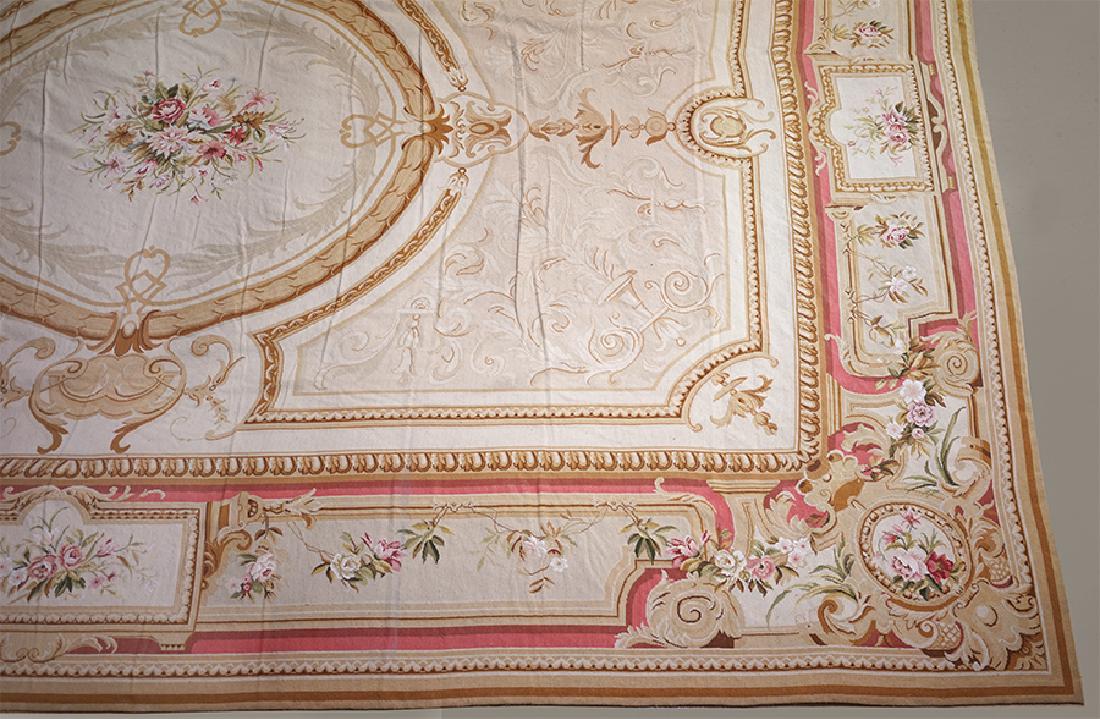 An Aubusson Carpet.: An Aubusson Carpet. Bearing a label 'Made in China' 17'5" x 12'
