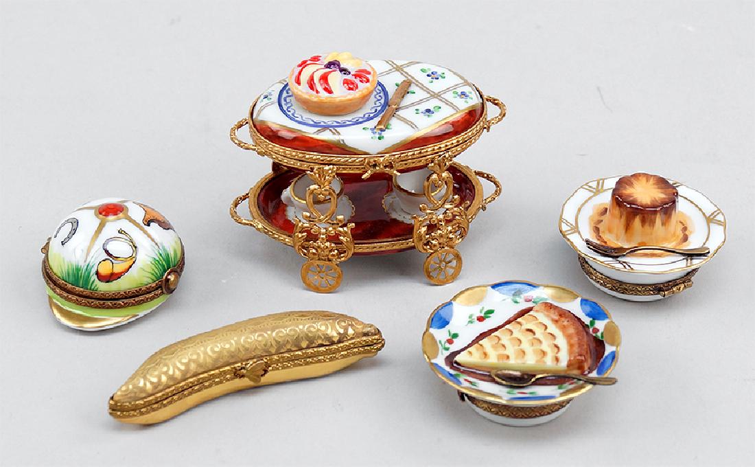 A Collection Of Limoges Boxes.: A Collection Of Limoges Boxes. Comprising a desert cart box, a golden pea pod box, a riding helmet box, and two desert form boxes 2.5" x 3.75" x 2"