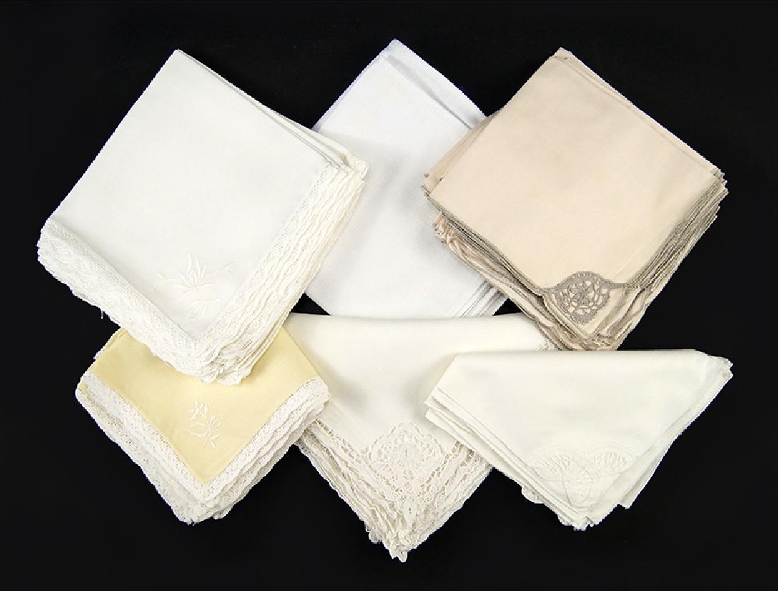A Collection Of Table Linens.: A Collection Of Table Linens. Comprising lace and embroidered dinner napkins of varying sizes
