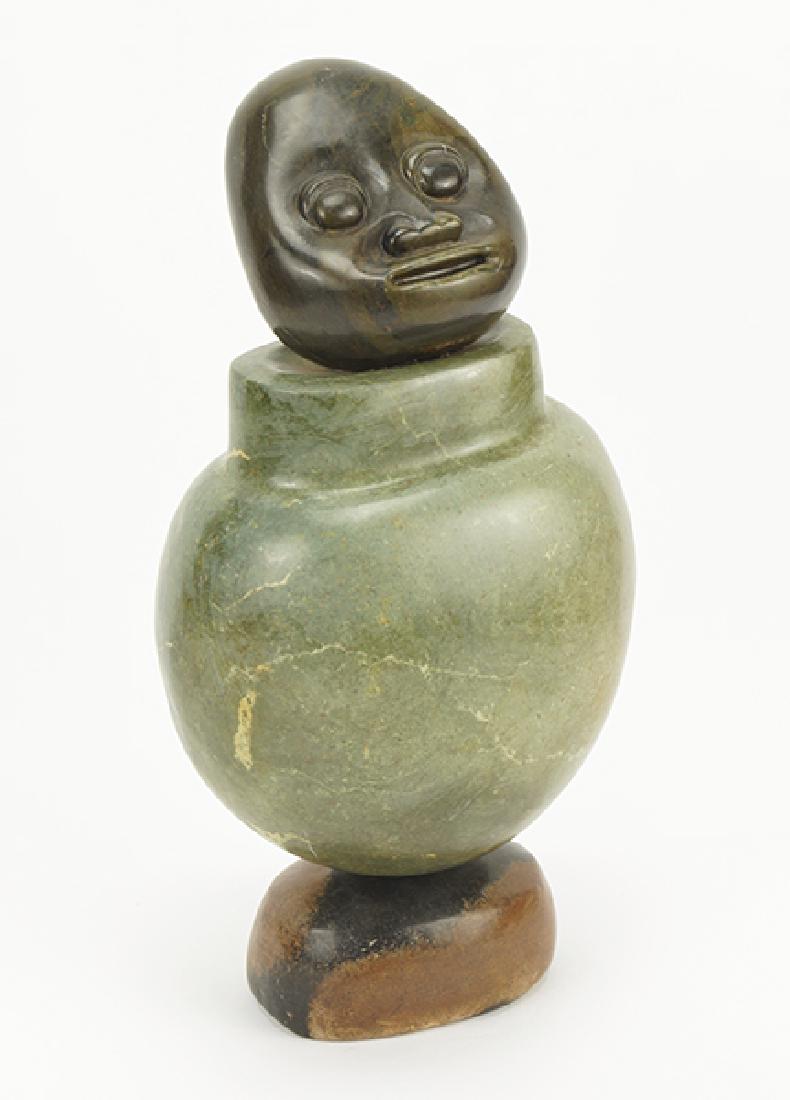 An African Stone Sculpture.: An African Stone Sculpture. A three piece carved soapstone sculpture depicting an armless figure raised on a base. Accompanied by a bill of sale stating the work is by Aaron Chikumbrike. Height: 20"