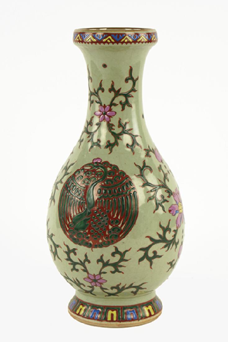 A Chinese Kangxi Style Celadon Glazed Yuhuchunping: A Chinese Kangxi Style Celadon Glazed Yuhuchunping Vase. With an enameled foliate and phoenix decoration, bearing a leaf mark on the underside Height: 13.25"
