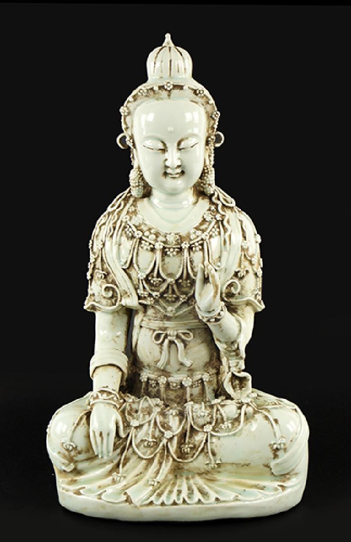 A Chinese Celadon Glazed Porcelain Figure of the Seated (1 of 1)