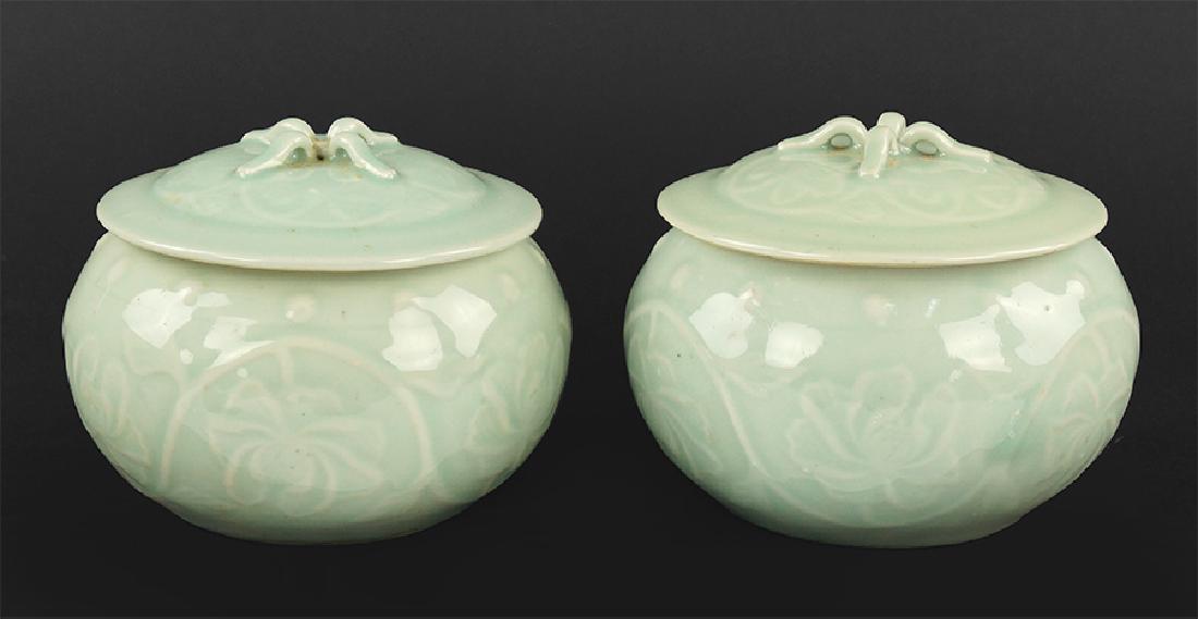 A Pair of Celadon Glazed Porcelain Covered Jars. (1 of 1)