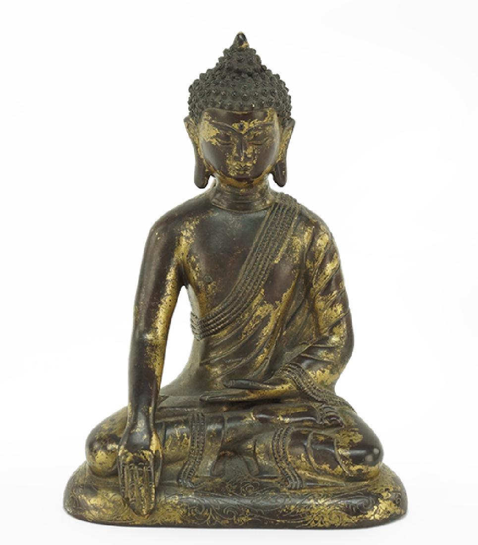 A Parcel Gilt Bronze Shakyamuni Buddha Figure. (1 of 5)