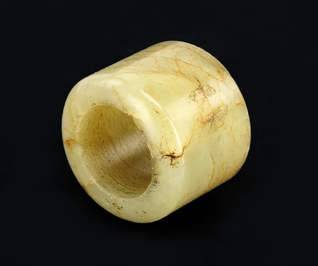 A Chinese Russet Jade Archer's Ring. (1 of 1)