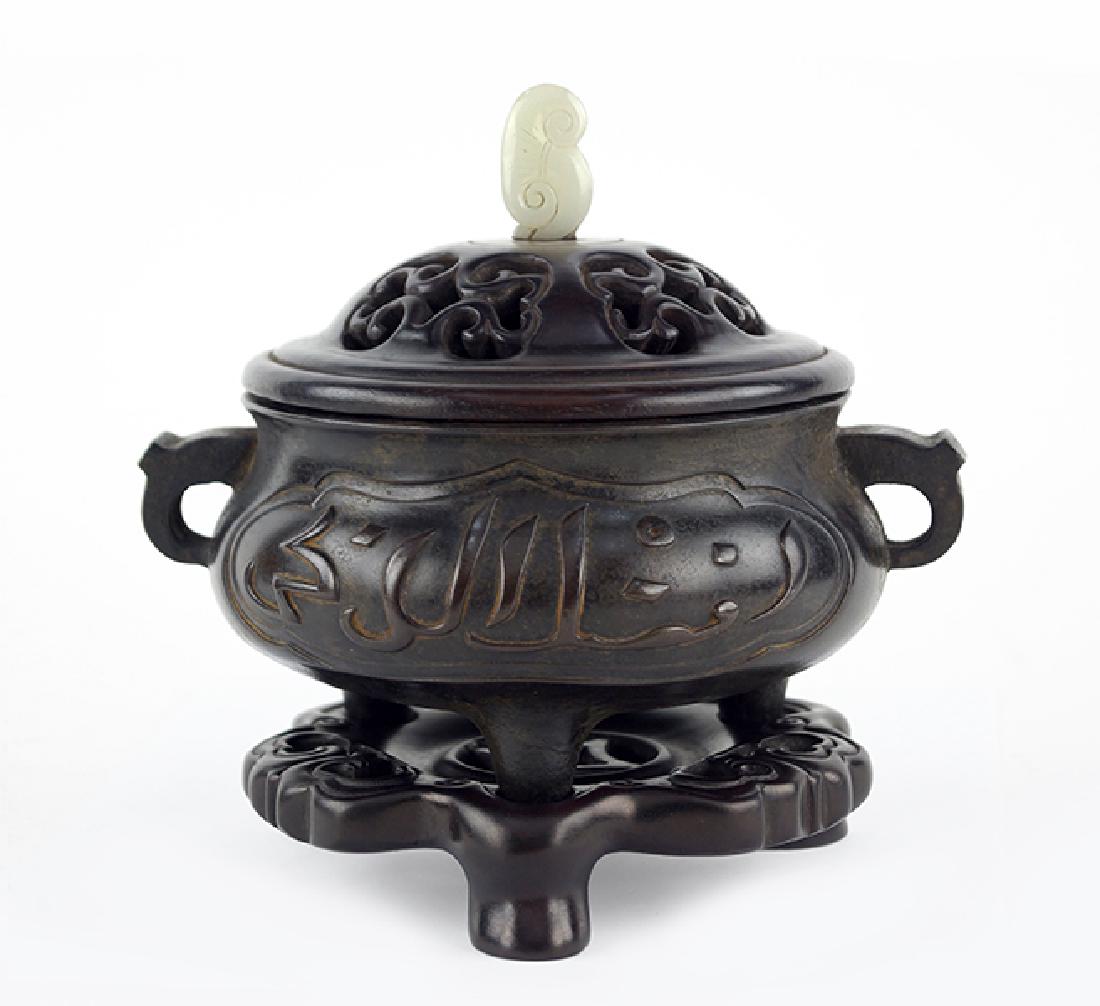 A Chinese Patinated Bronze Censer. (1 of 11)