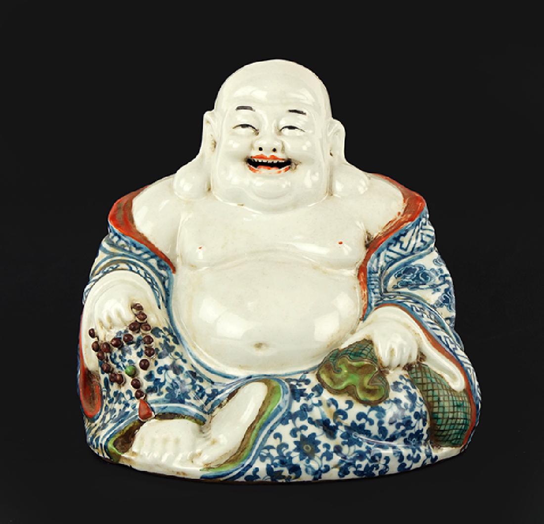 A Chinese Porcelain Seated Laughing Buddha Figure. (1 of 1)