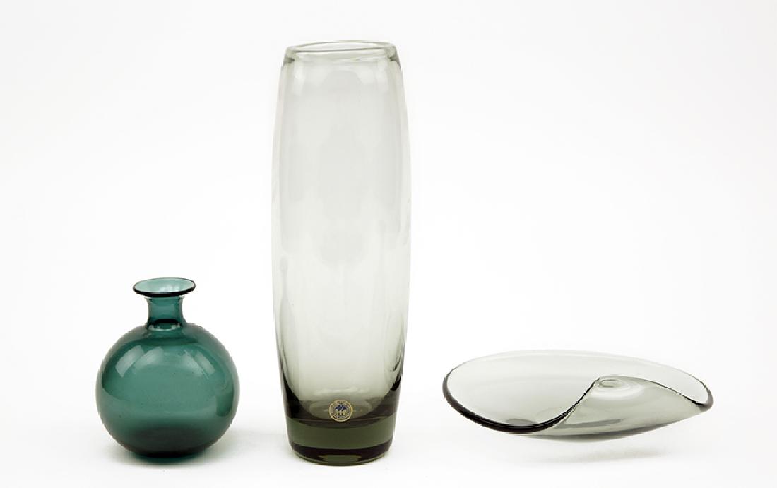 Per Lutken (Danish, 1916-1998) Two Holmegaard: Per Lutken (Danish, 1916-1998) Two Holmegaard Glassworks. Comprising a vase and a dish with foldover edge. Both are signed on the underside. Together with a Holmegaard glass bottle vase Lutken vase he