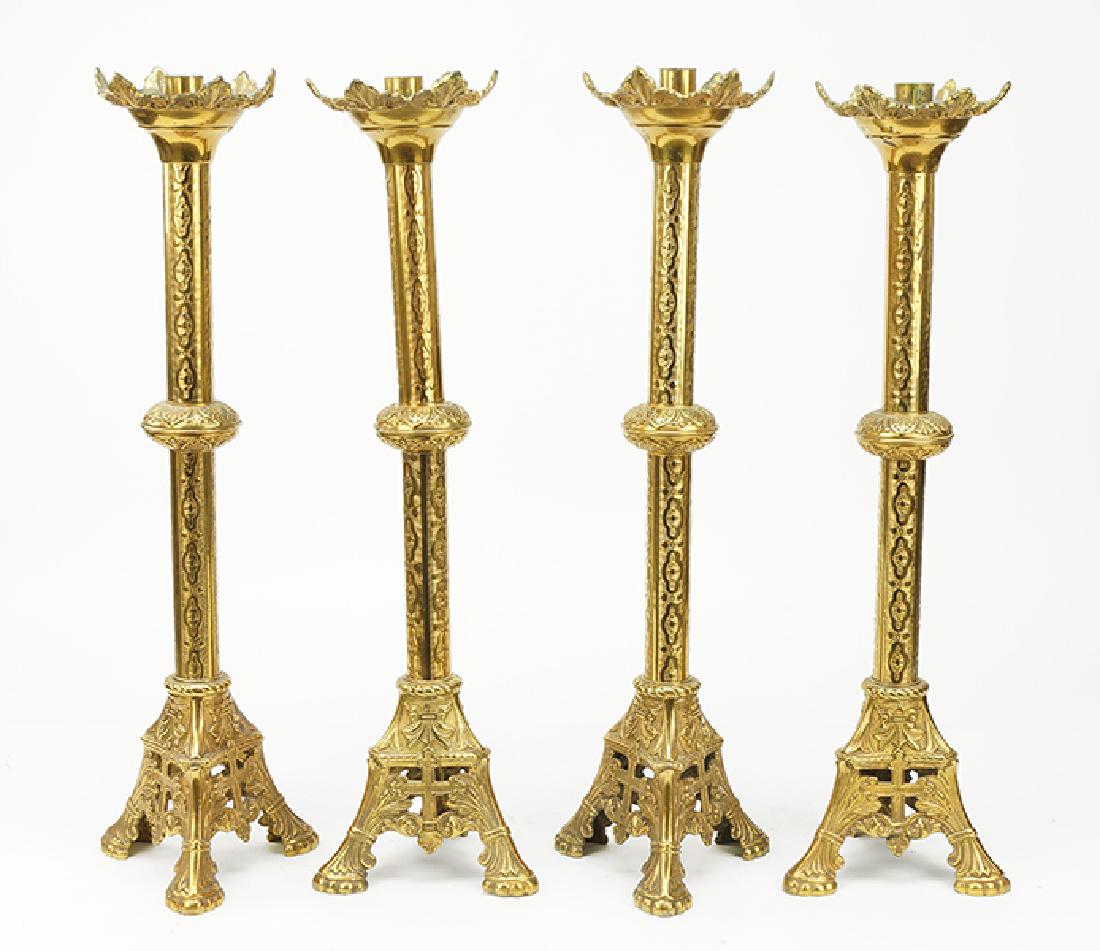 A Set Of Four Brass Altar Candlesticks. (1 of 1)