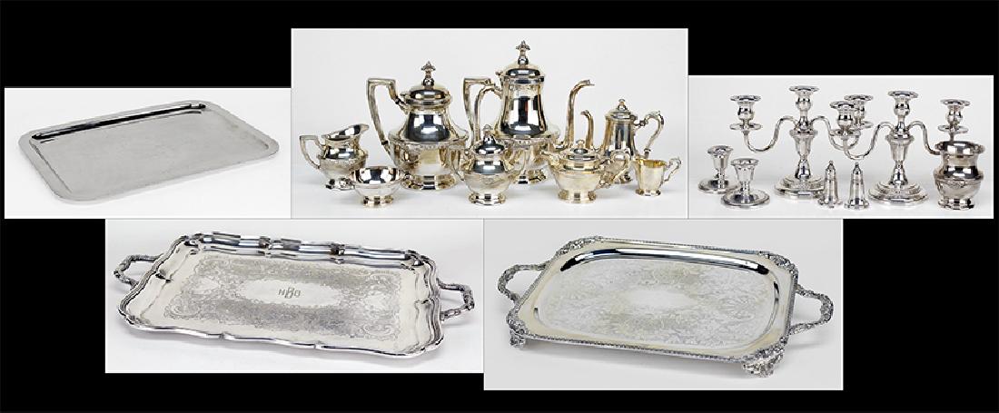 A Pair of Weighted Sterling Silver Low Candlesticks. (1 of 3)