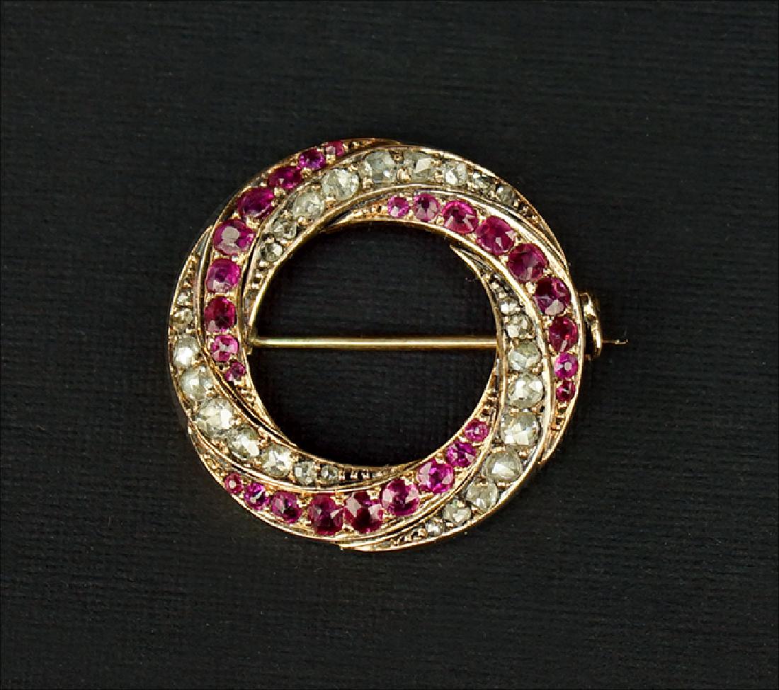 A Diamond and Ruby Brooch. (1 of 1)