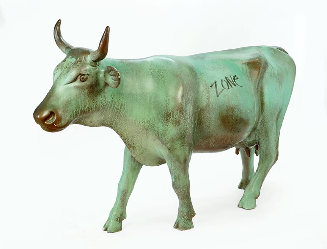 A Painted Fiberglass Cow Sculpture. (1 of 1)