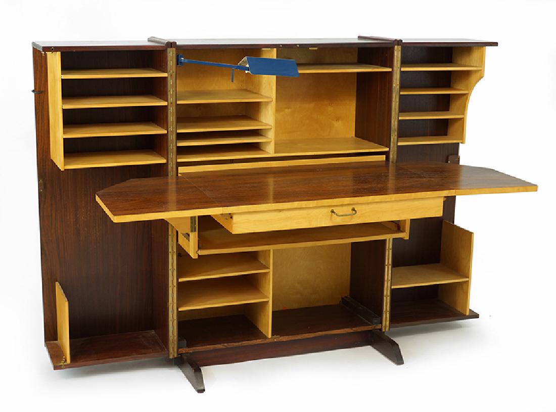A Teak Hideaway Desk. (1 of 2)