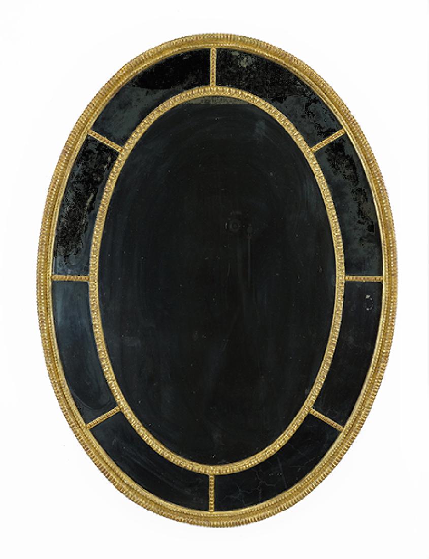 An Adam Oval Giltwood Mirror. (1 of 1)
