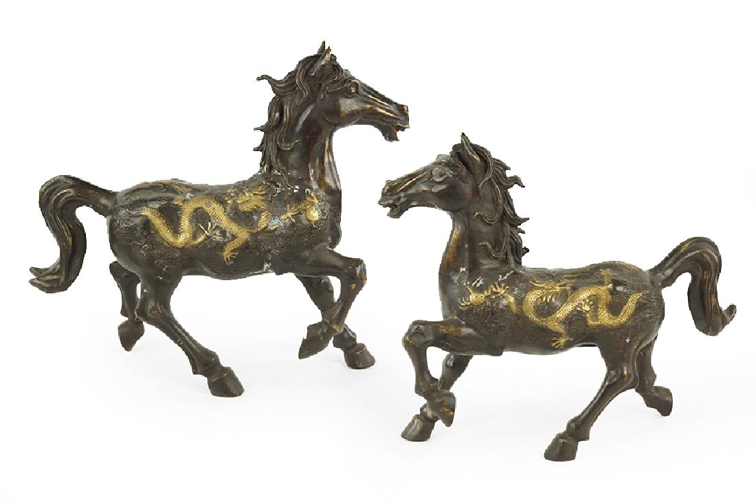 A Pair of Patinated Cast Bronze Horses. (1 of 1)
