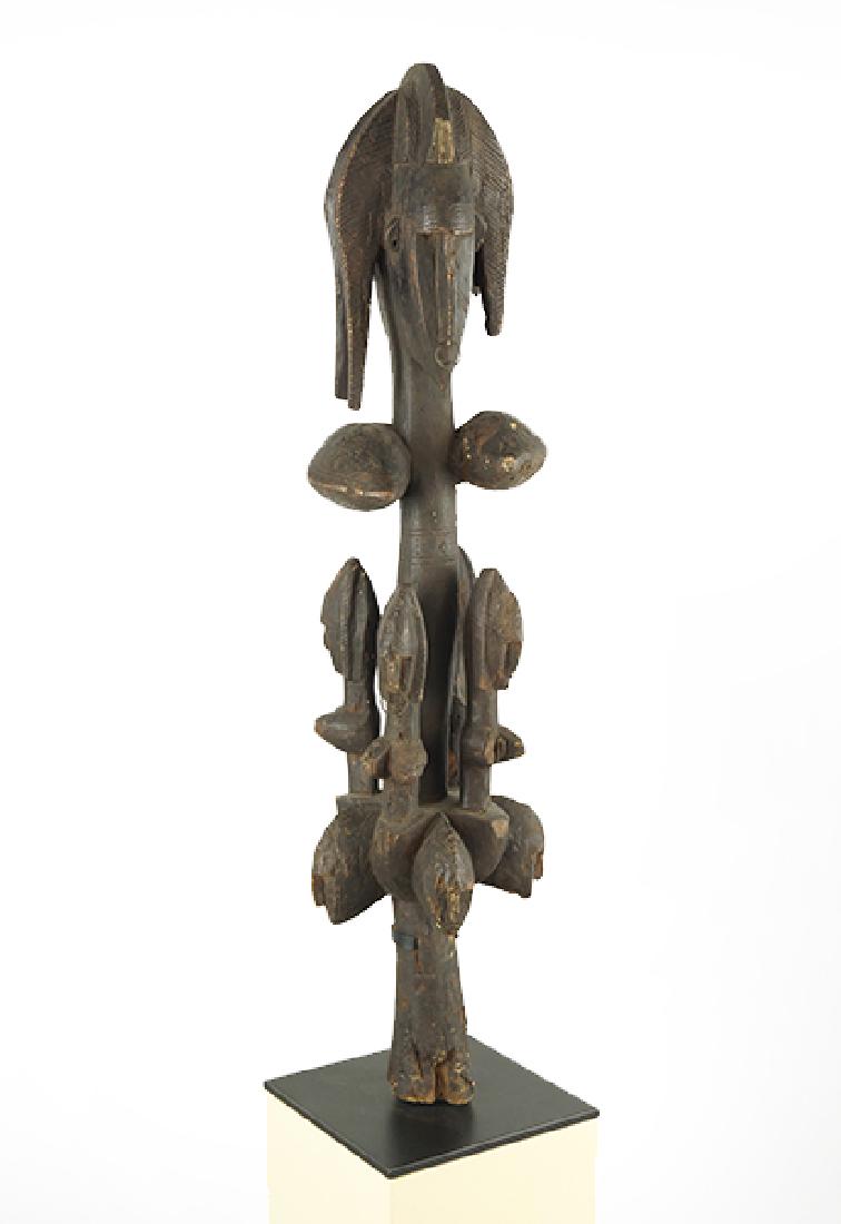 An African Carved Wood Figure. (1 of 2)