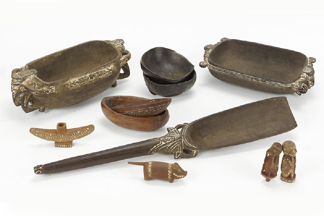 A Group Of Papua New Guinea Decorative Objects.: A Group Of Papua New Guinea Decorative Objects. Comprising six decorated wood bowls, three small wood figures, a wood shovel with a figural handle, and a decorated wood stand Largest Bowl: 14" x 6.5"