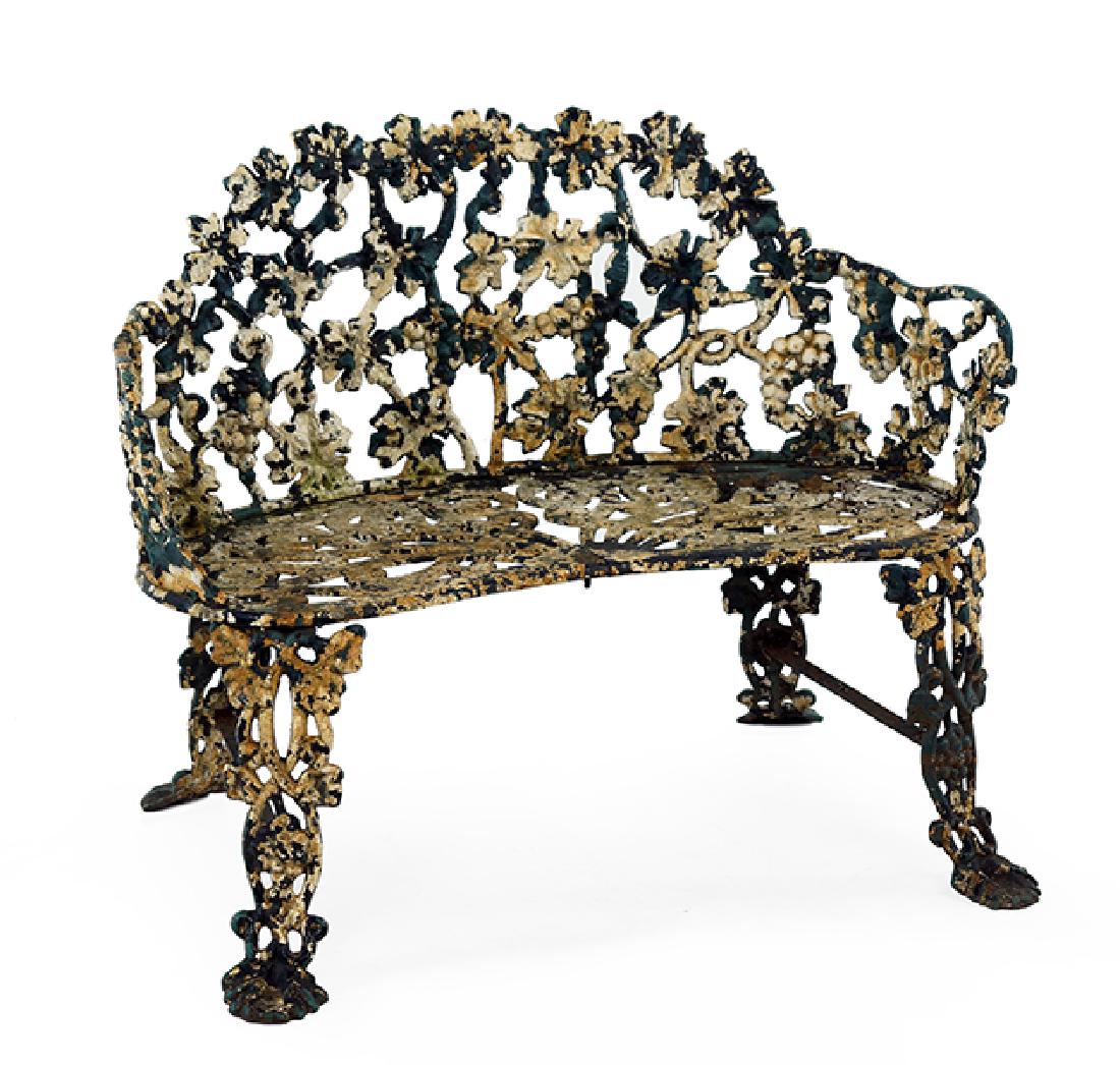 An Iron Garden Settee.: An Iron Garden Settee. 29" x 37" x 26"