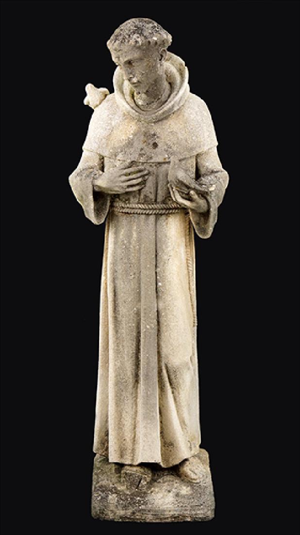 A Concrete Statue of St. Francis Of Assisi.