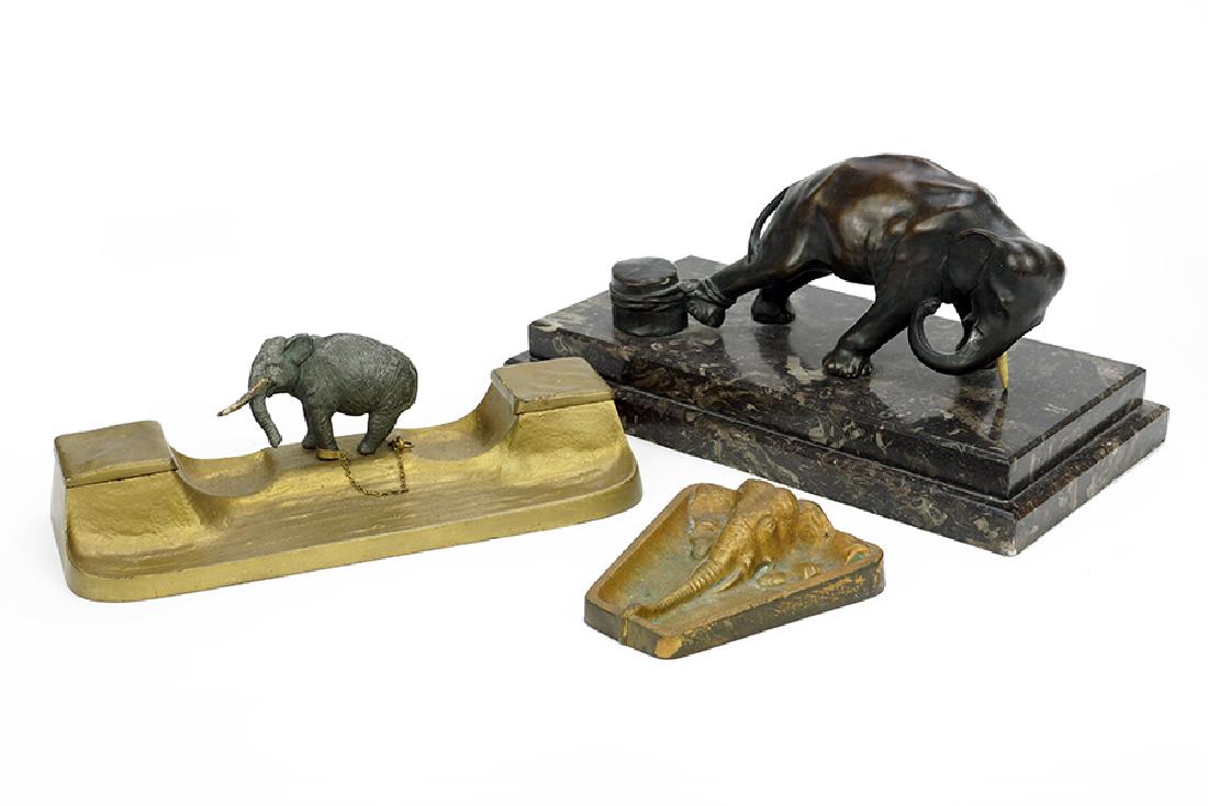 A Patinated Metal Elephant Sculpture. (1 of 1)