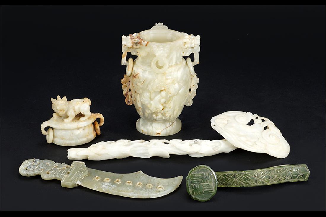 A Carved Stone Lidded Urn. (1 of 1)