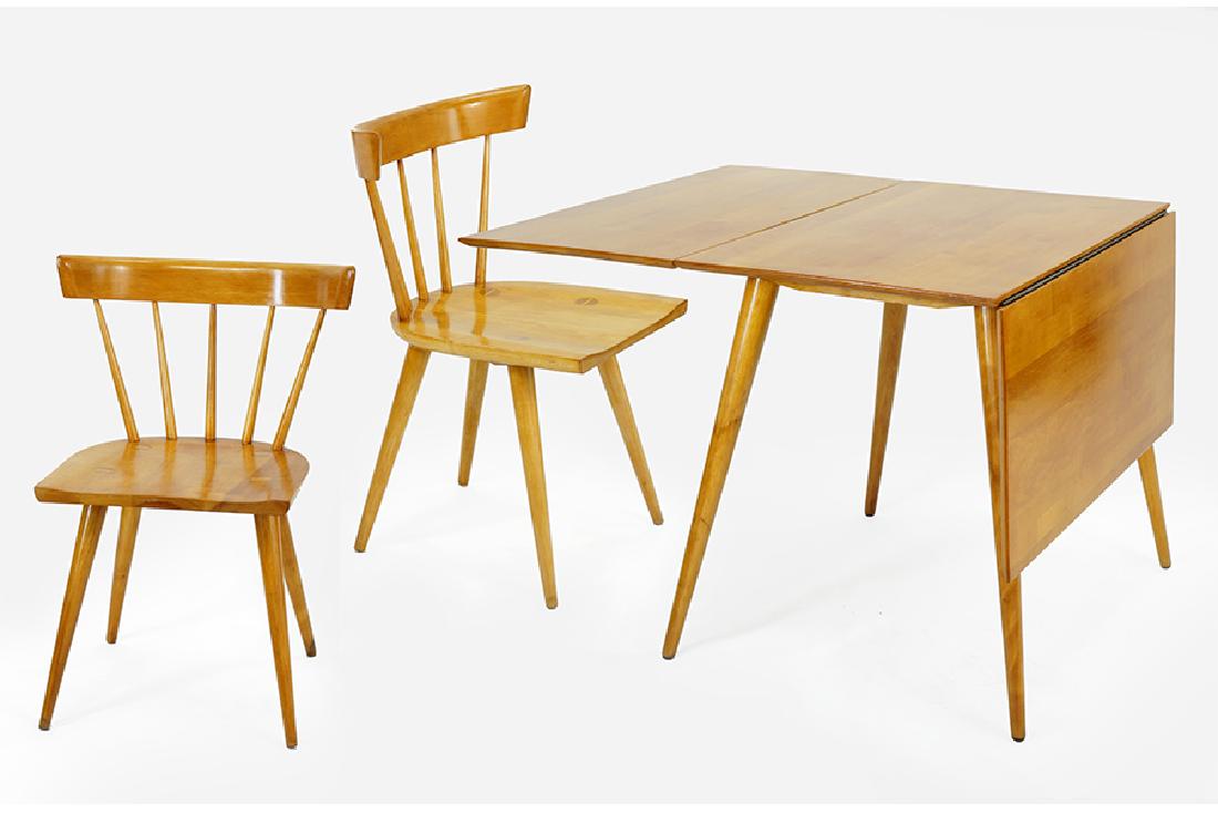 A Paul McCobb Planner Group Table and Chairs. (1 of 2)