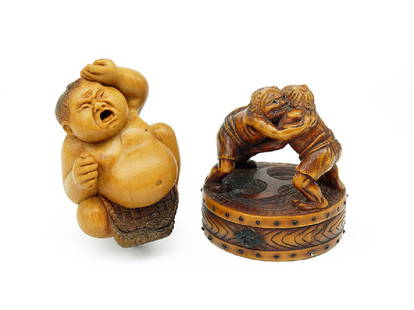 Two Carved Wood Netsukes Depicting Sumo Wrestlers.: Two Carved Wood Netsukes Depicting Sumo Wrestlers. One depicting two wrestlers on top of a drum, signed 'Tei or Yadoya' and one contemporary by Alexander Derkachenko Two wrestlers: 1.75" x 1.5"