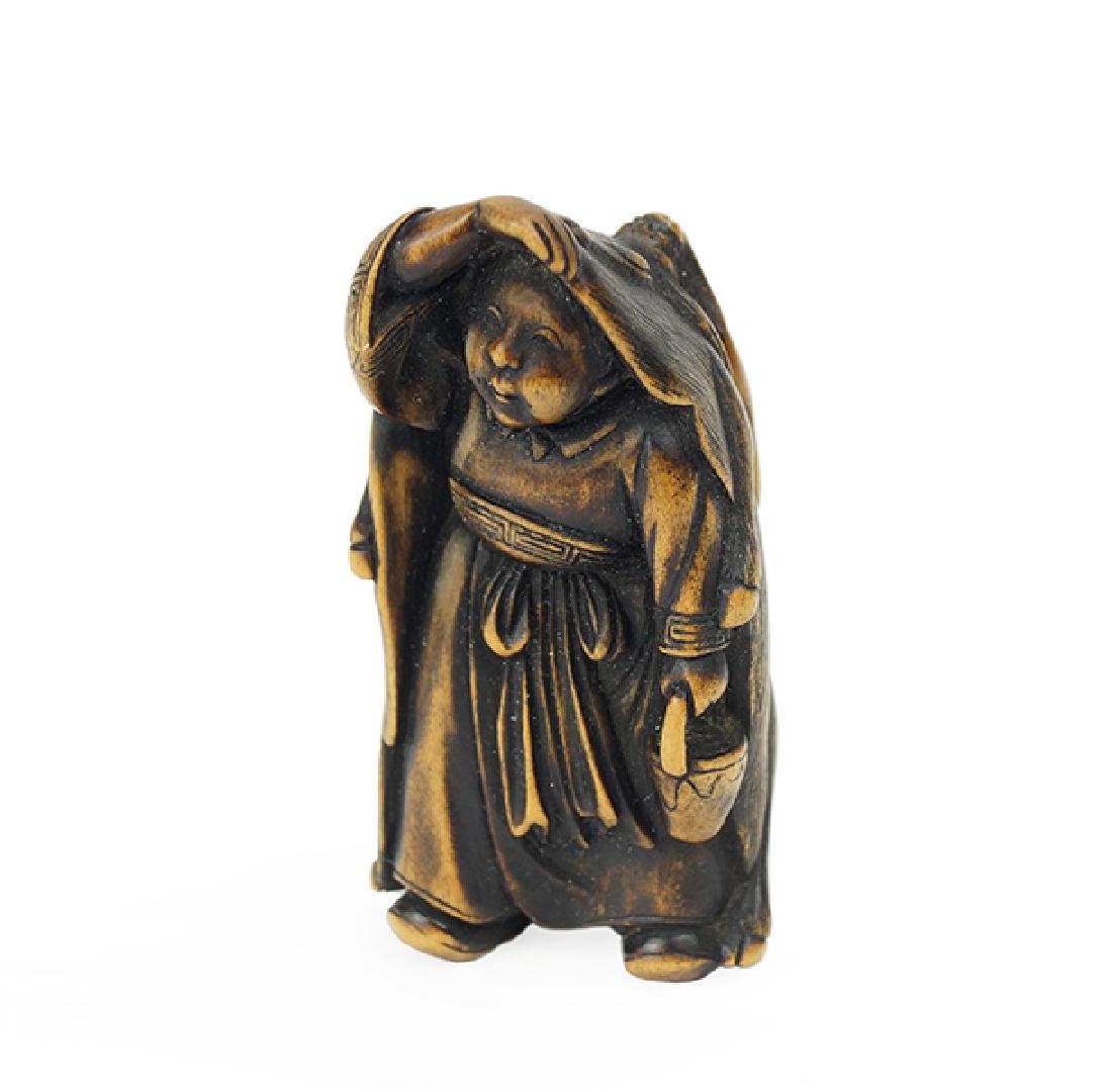 A 19th Century Carved Wood Netsuke. (1 of 5)