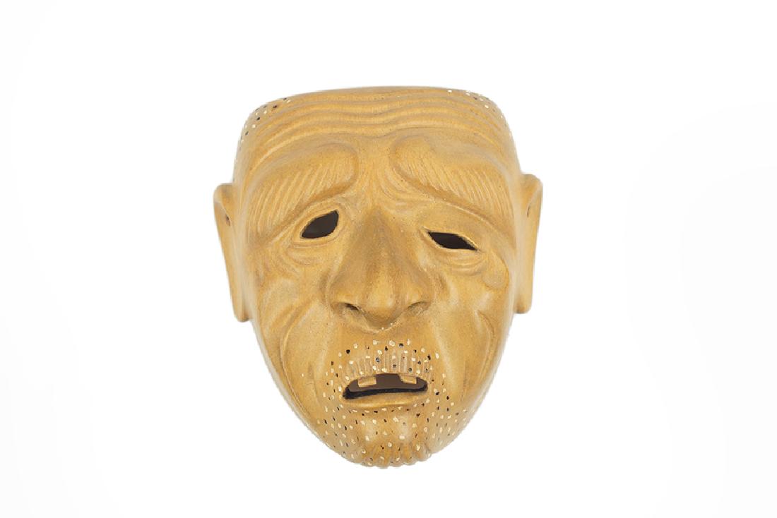 A 20th Century Carved Boxwood Mask Netsuke Depicting (1 of 4)