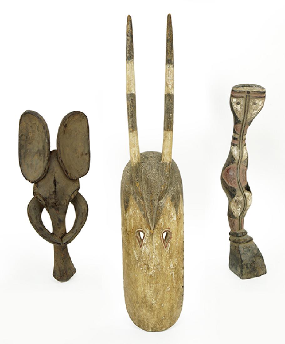 A Group Of Carved Wood African Pieces. (1 of 1)