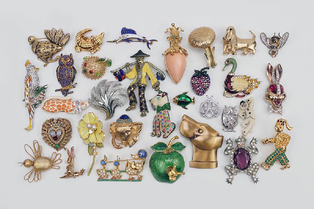A Collection of Brooches.: A Collection of Brooches. Signed pieces by Robert, Trifari, Grosse, St. John, Boucher, Corocraft, Hattie Carnegie, Panetta, Pauline Rader, Weiss, Karu Fifth Avenue and other unsigned pieces